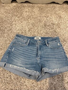 PAIGE Washed Blue Distressed Denim Cutoff Shorts